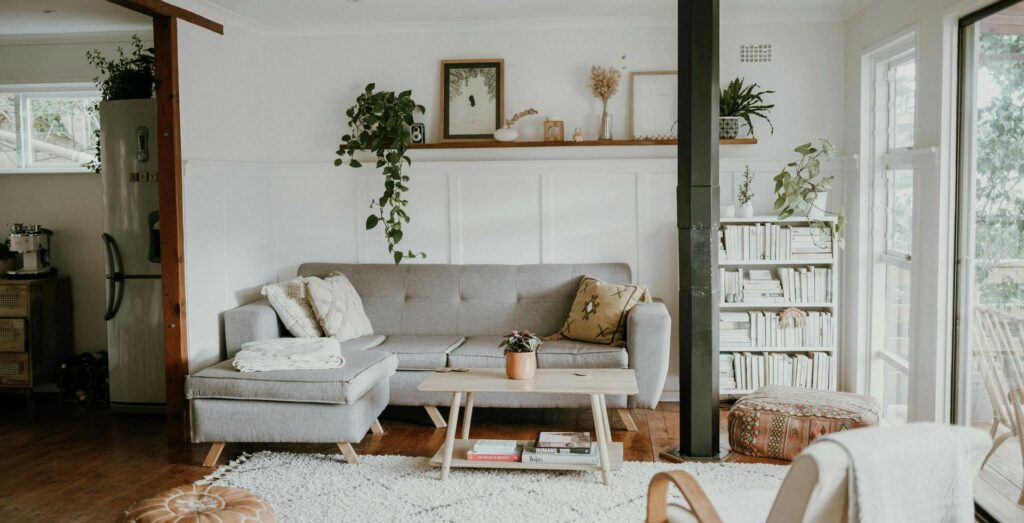 Image by Tarryn Elliot / Pexels https://www.pexels.com/photo/gray-couch-in-the-living-room-9565787/